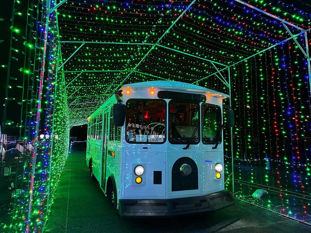 View of the front of the Jolly Trolley going through the tunnel.